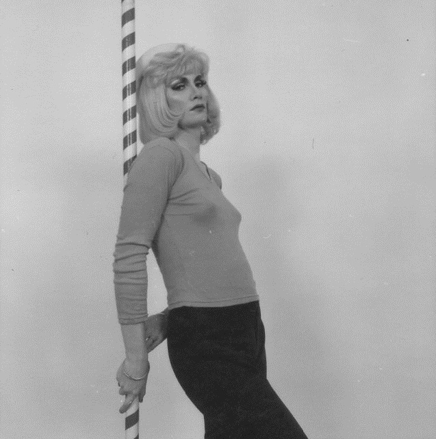 Jayne leaning against a pole for NME shoot