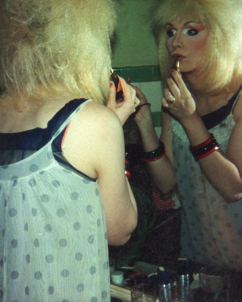 Jayne applying lipstick at The Pyramid Club 1988